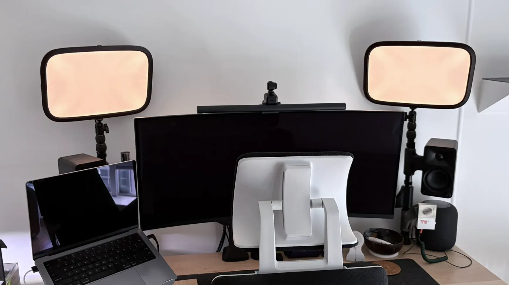 Two illuminated Key Lights mounted on either side of my desk monitor.